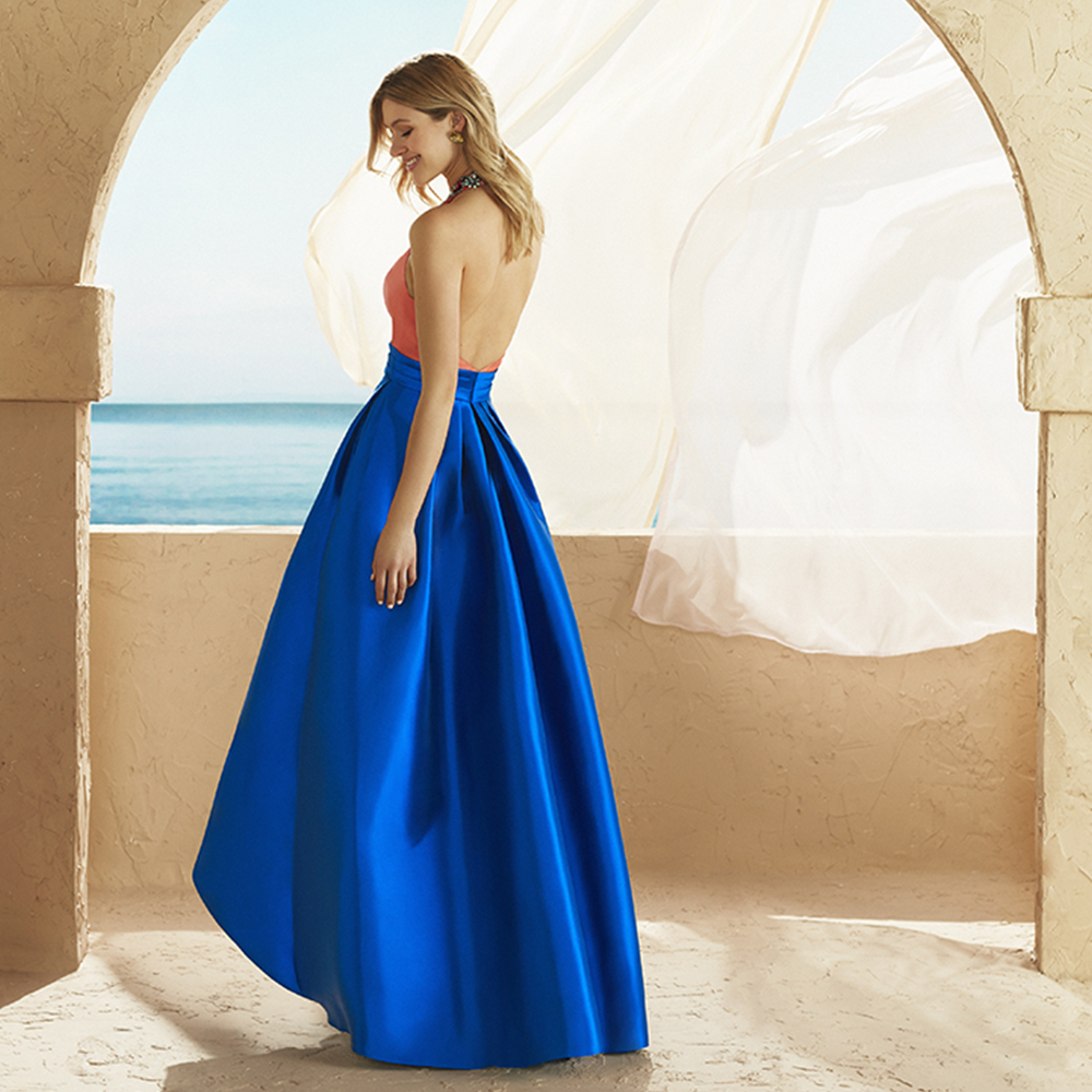 Paula Echevarría sigue apostando por el estilo boho luciendo dos vestidos  largos en azul y naranja ideales